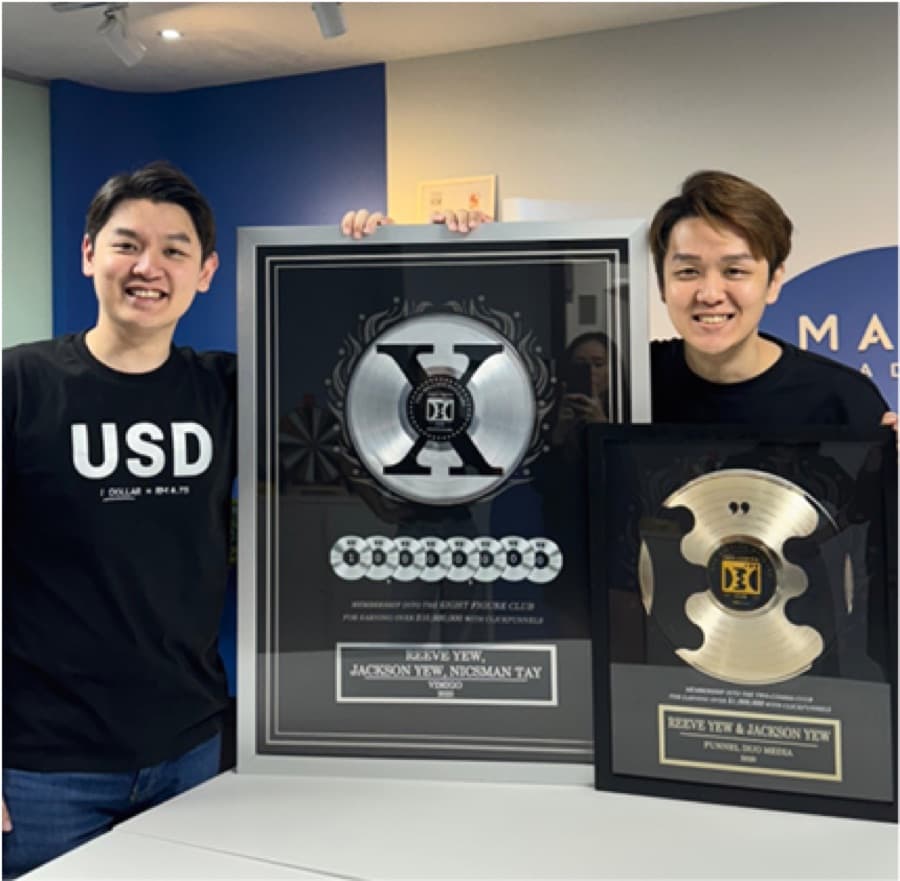 Two Comma Club X plaque