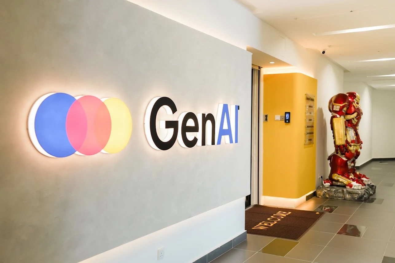 GenAI HQ entrance with the illuminated GenAI sign and a red and gold robot figure